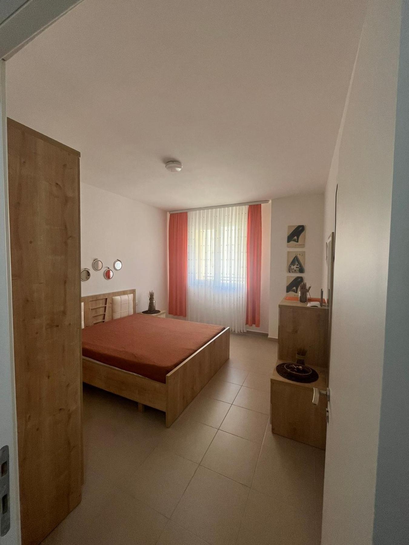 Shengjin Apartamento